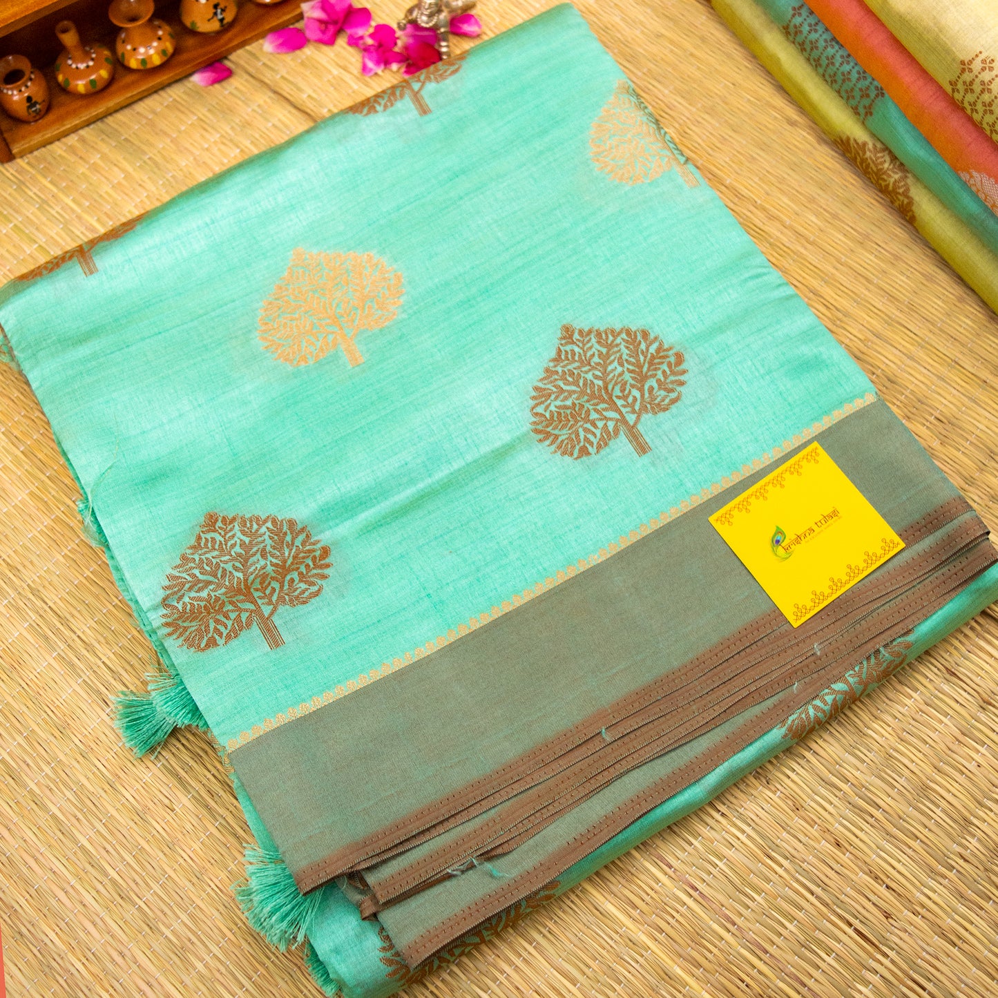 Pale Turquoise Semi Raw Silk Saree with Copper & Gold Zari Tree Motifs